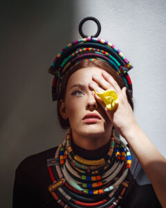 Just like a statement wall can be all a home needs to go from masterful to divine, so can statement jewelry elevate an elegant black dress. Balenciaga asymmetric cape-effect maxi dress; Lada Legina 3D Printed ring; the stylist’s African necklaces, cuffs and headpiece.